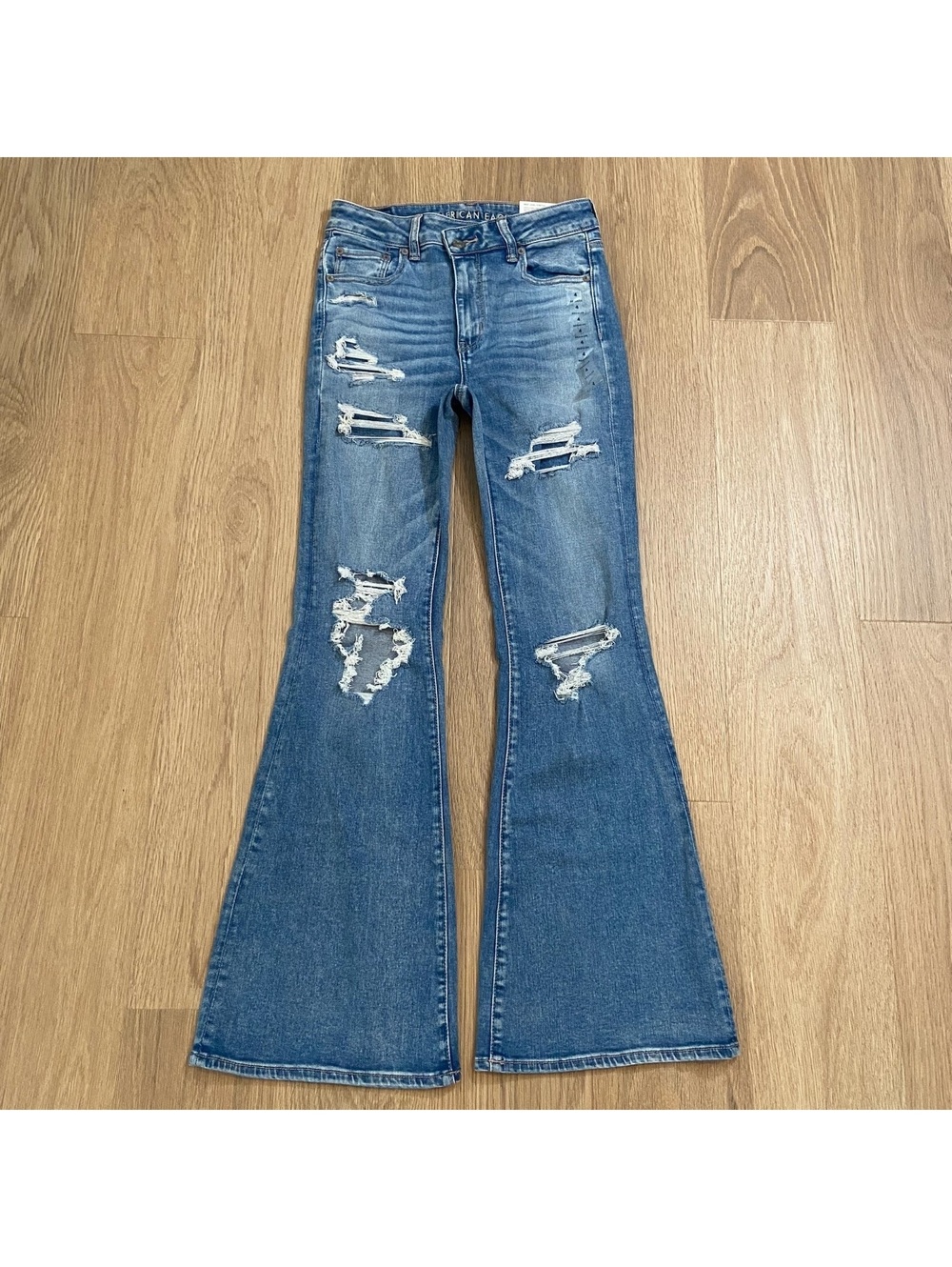 NWT American Eagle Super Hi-Rise Flare Distressed Blue Jeans Size 4